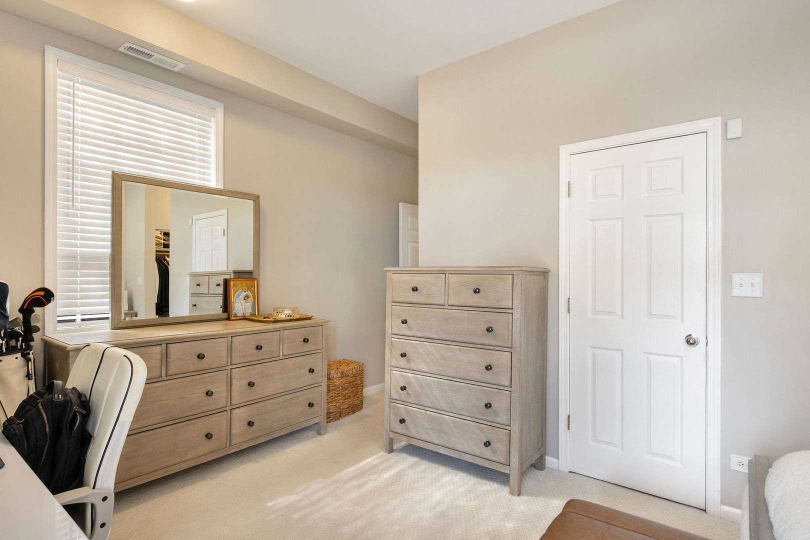 1529 West Montana Street, Unit 2 Chicago, IL 60614 - Photo 20 of 32 a room with a dresser and a mirror
