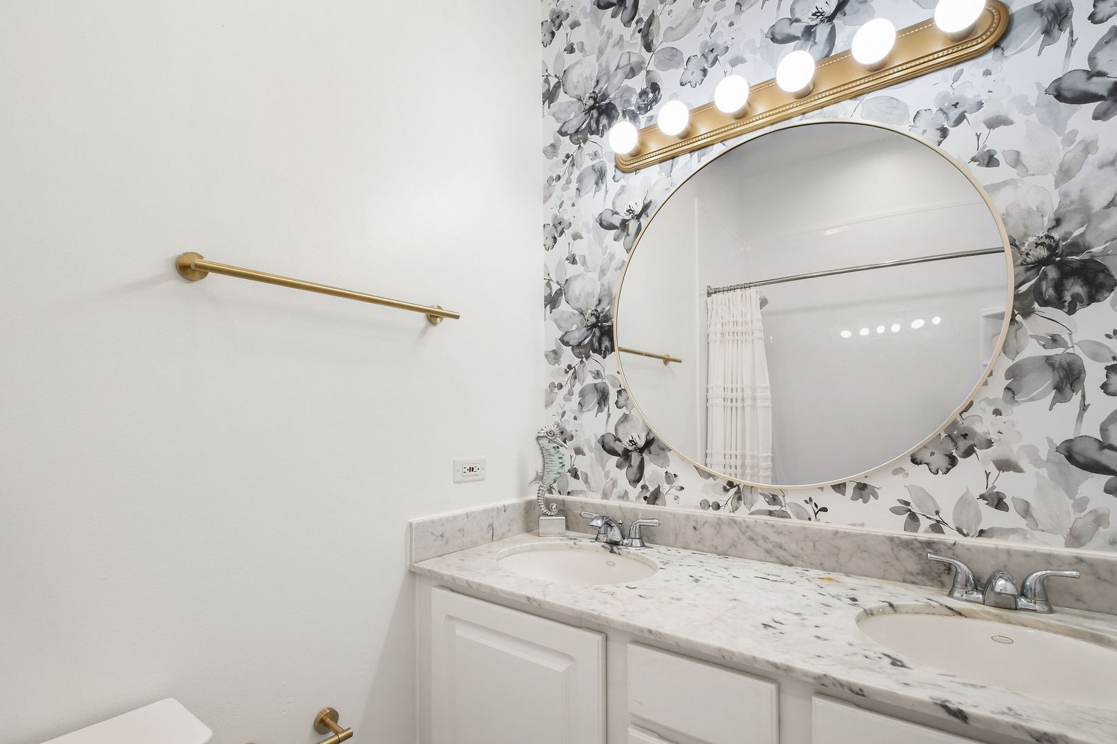 1529 West Montana Street, Unit 2 Chicago, IL 60614 - Photo 25 of 32 a bathroom with a sink and mirror