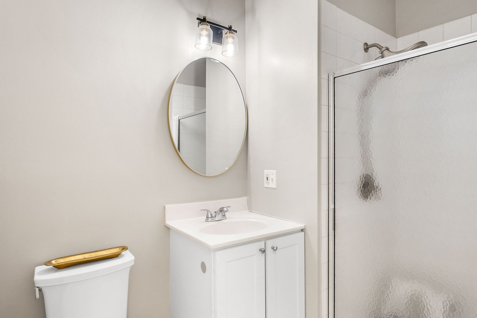 1529 West Montana Street, Unit 2 Chicago, IL 60614 - Photo 26 of 32 a bathroom with a sink a toilet and a mirror
