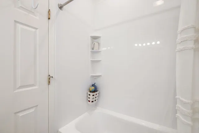 a bathroom with a bathtub