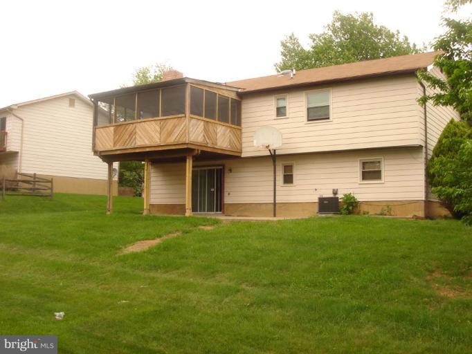 4018 Winlee Road Randallstown, MD 21133 - Photo 2 of 5 a front view of a house with a garden