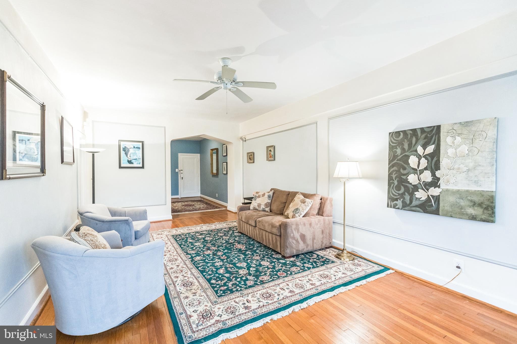 2737 Devonshire Place Northwest, Unit 7 Washington, DC 20008 - Photo 12 of 36 a living room with furniture and a window