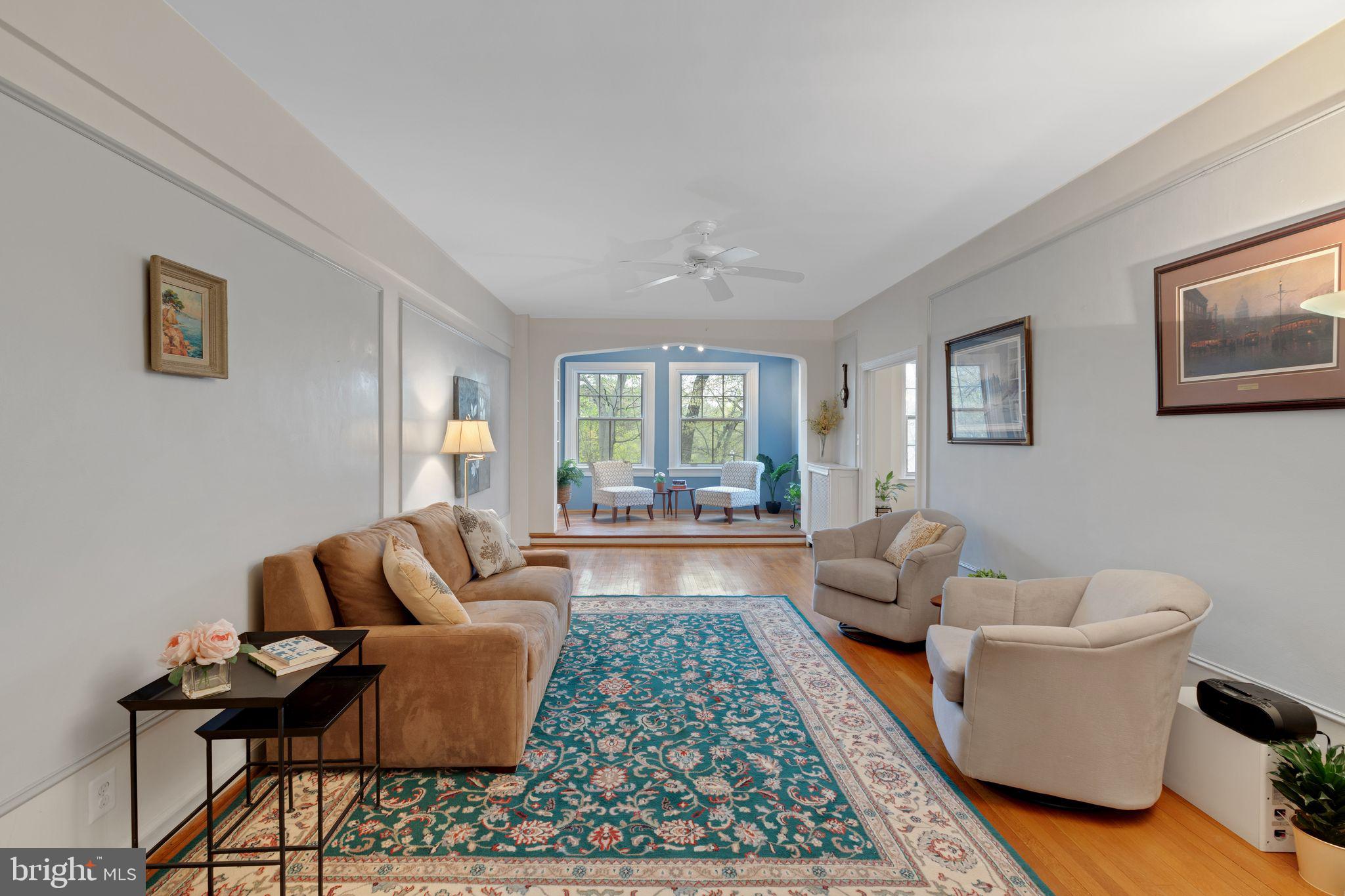 2737 Devonshire Place Northwest, Unit 7 Washington, DC 20008 - Photo 14 of 36 a living room with furniture and a rug