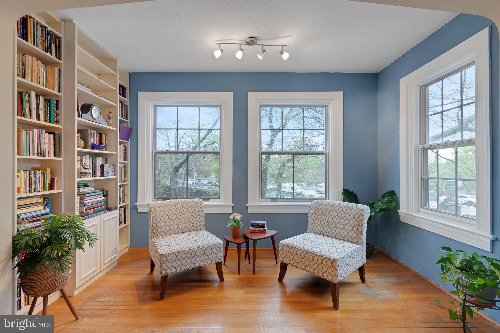 2737 Devonshire Place Northwest, Unit 7 Washington, DC 20008 - Photo 15 of 36 a living room with furniture and a potted plant or book shelf