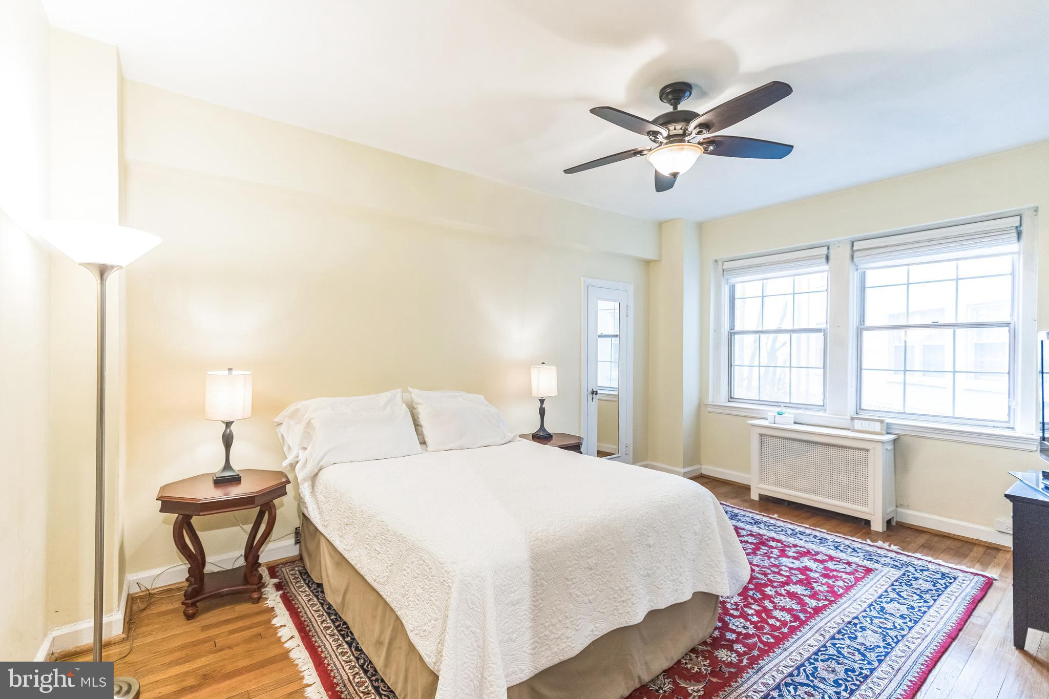 2737 Devonshire Place Northwest, Unit 7 Washington, DC 20008 - Photo 27 of 36 a bed room with a bed and a window