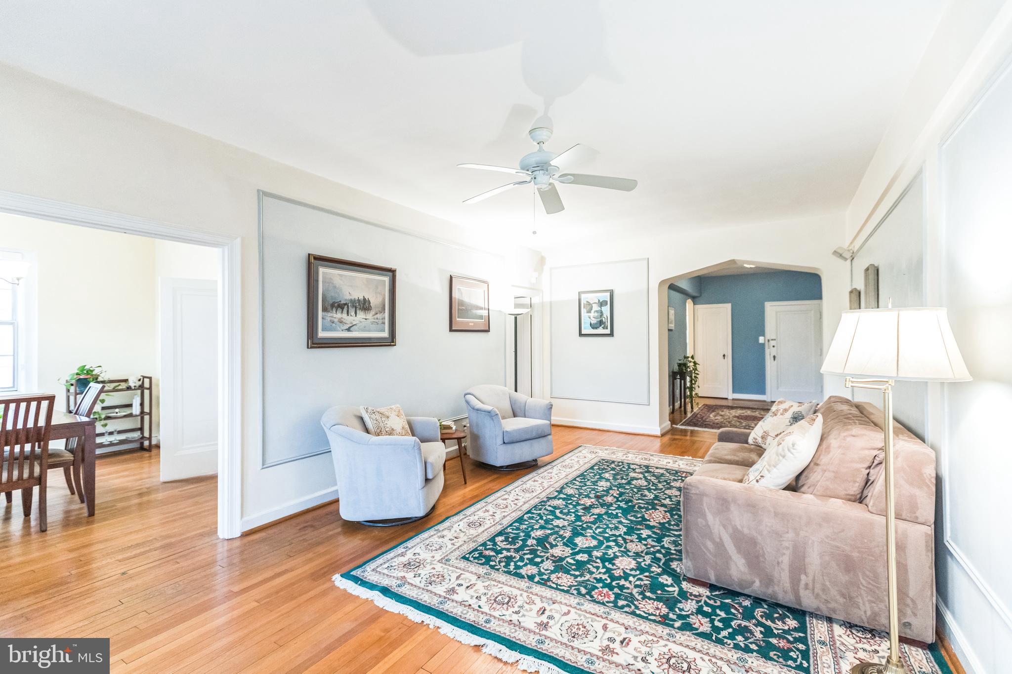 2737 Devonshire Place Northwest, Unit 7 Washington, DC 20008 - Photo 10 of 36 a living room with furniture rug and wooden floor
