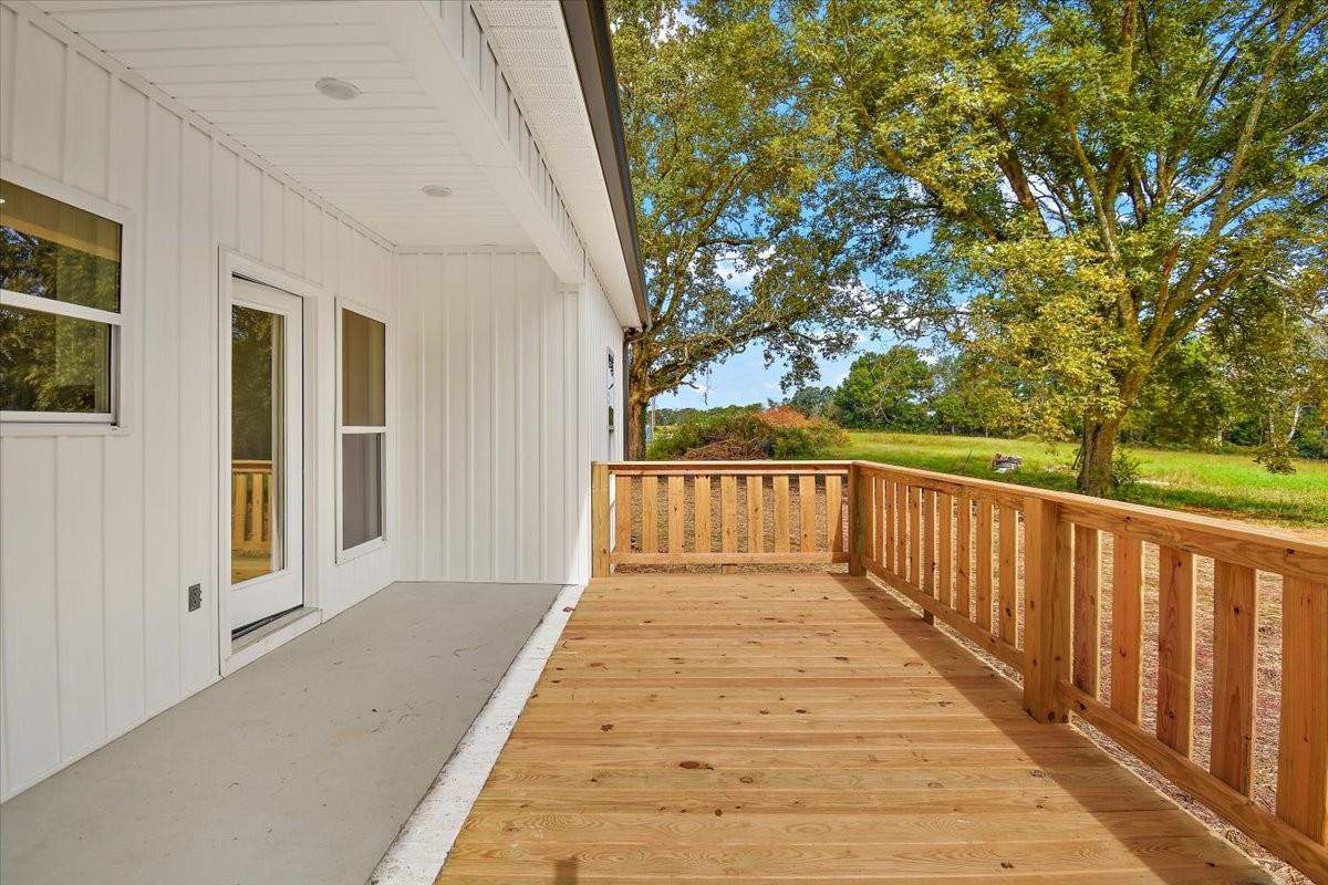 58 Jordan Road Lawrenceburg, TN 38464 - Photo 4 of 31 a view of a balcony with wooden floor