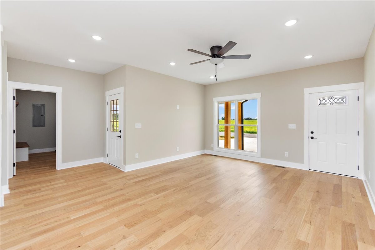 58 Jordan Road Lawrenceburg, TN 38464 - Photo 5 of 31 a view of an empty room with window and wooden floor