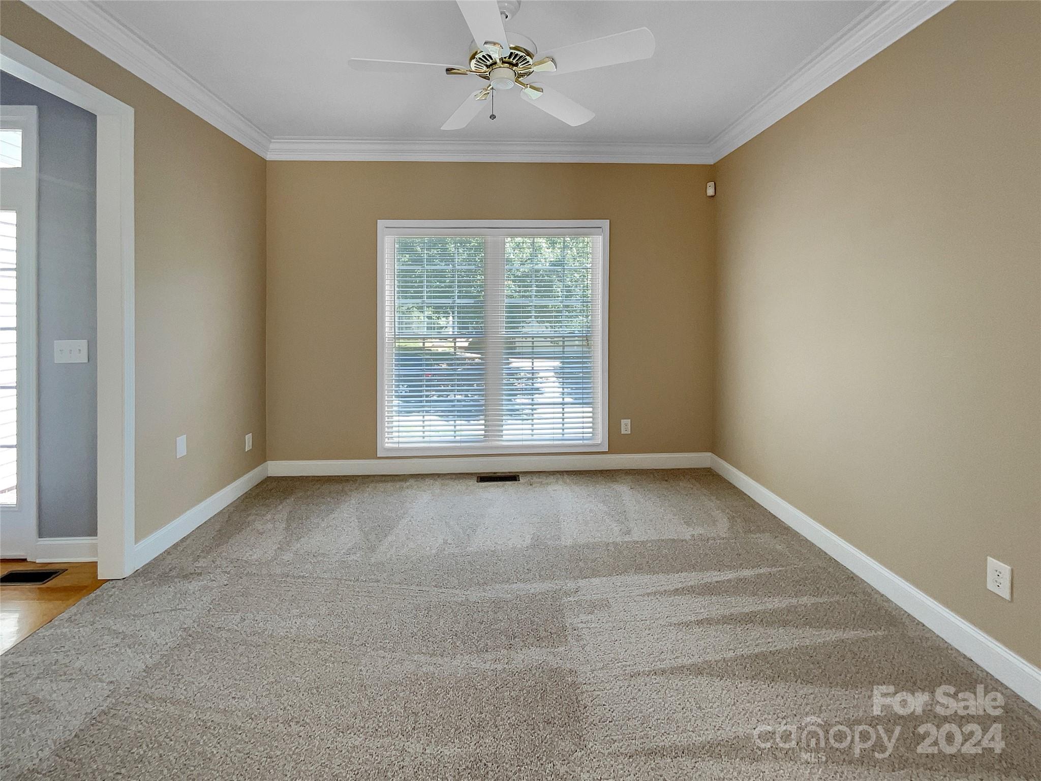 12047 Spinnaker Drive Fort Mill, SC 29708 - Photo 11 of 17 a view of an empty room with a window