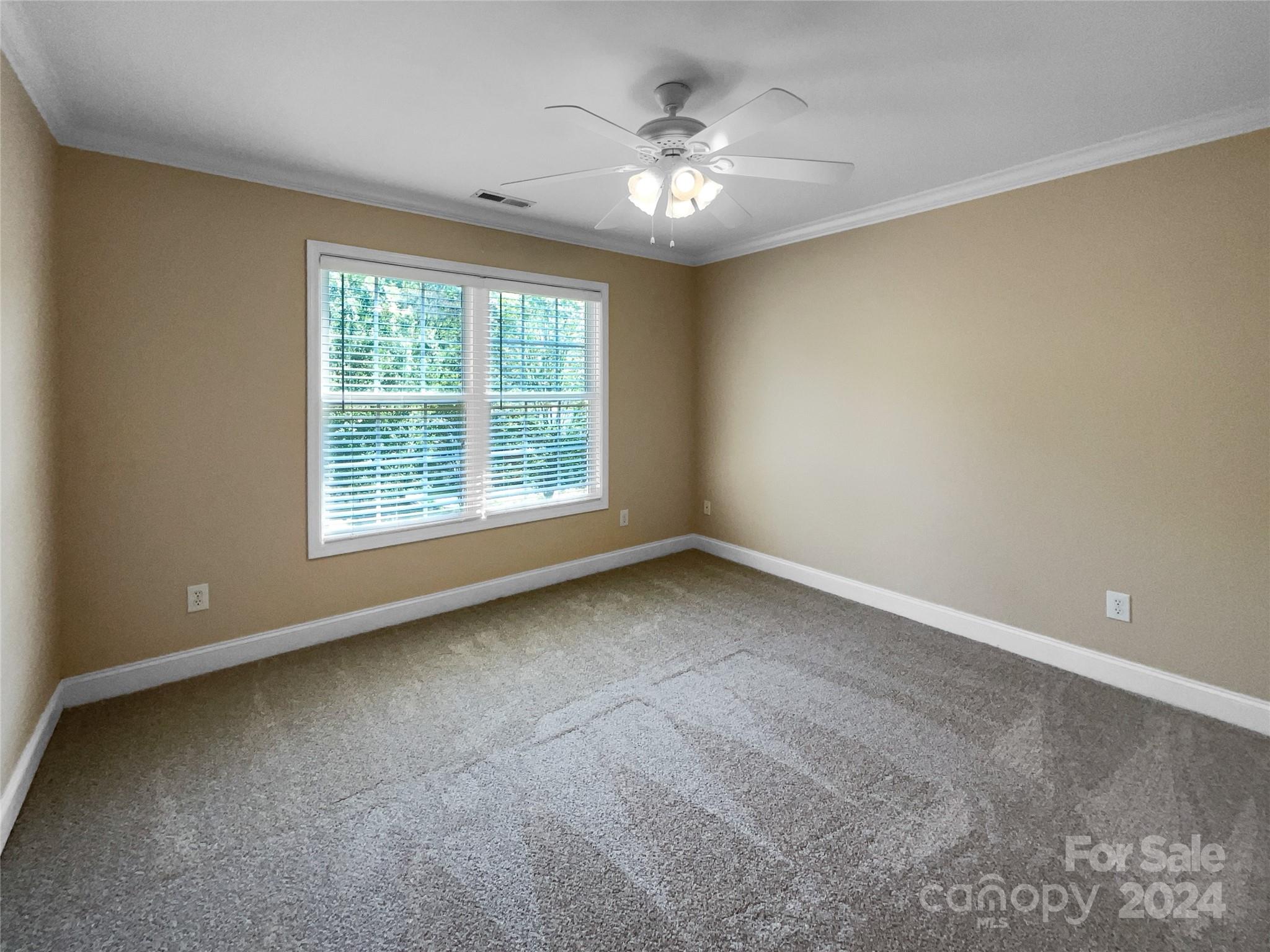 12047 Spinnaker Drive Fort Mill, SC 29708 - Photo 5 of 17 a view of an empty room with a window