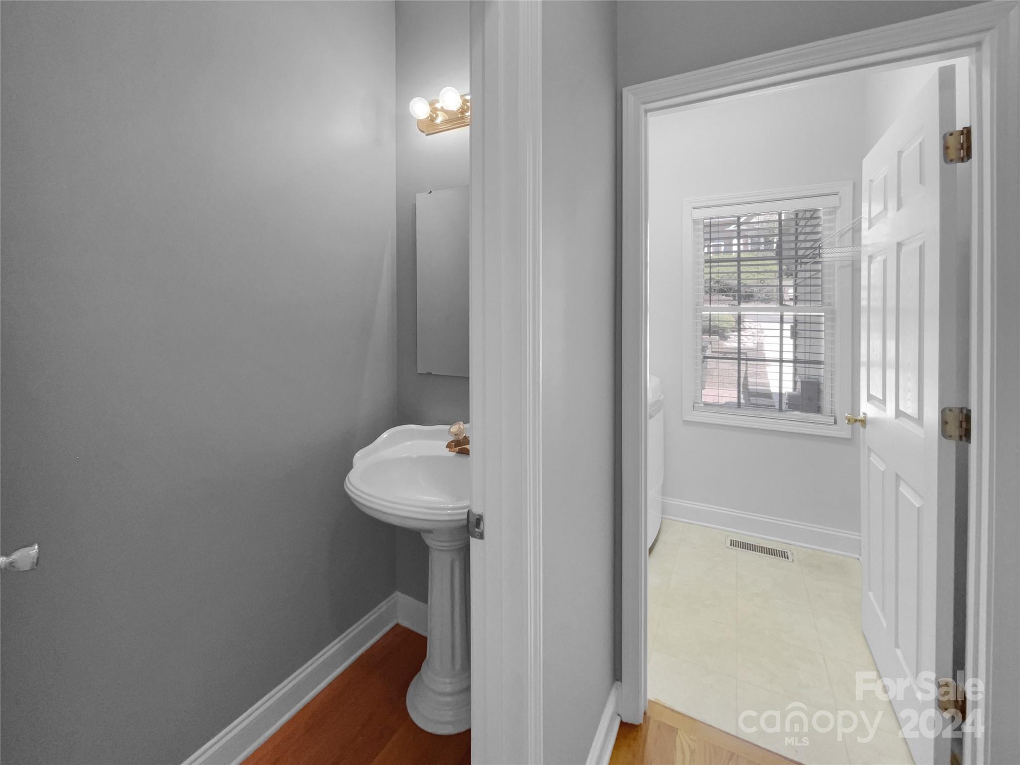 12047 Spinnaker Drive Fort Mill, SC 29708 - Photo 7 of 17 a bathroom with a sink and toilet