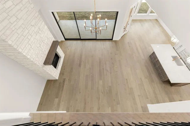 a view of a living room with a wooden floor