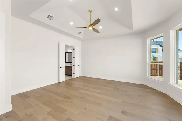 a view of empty room with windows