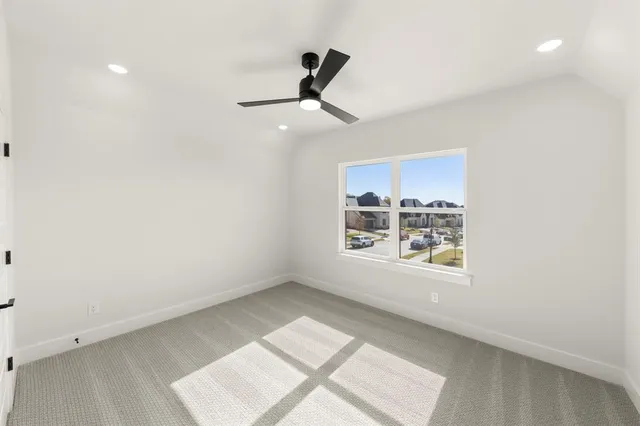 a bathroom with a sink a toilet a mirror a bathtub and shower