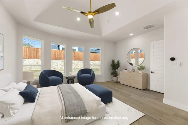 a bedroom with two beds and a large mirror