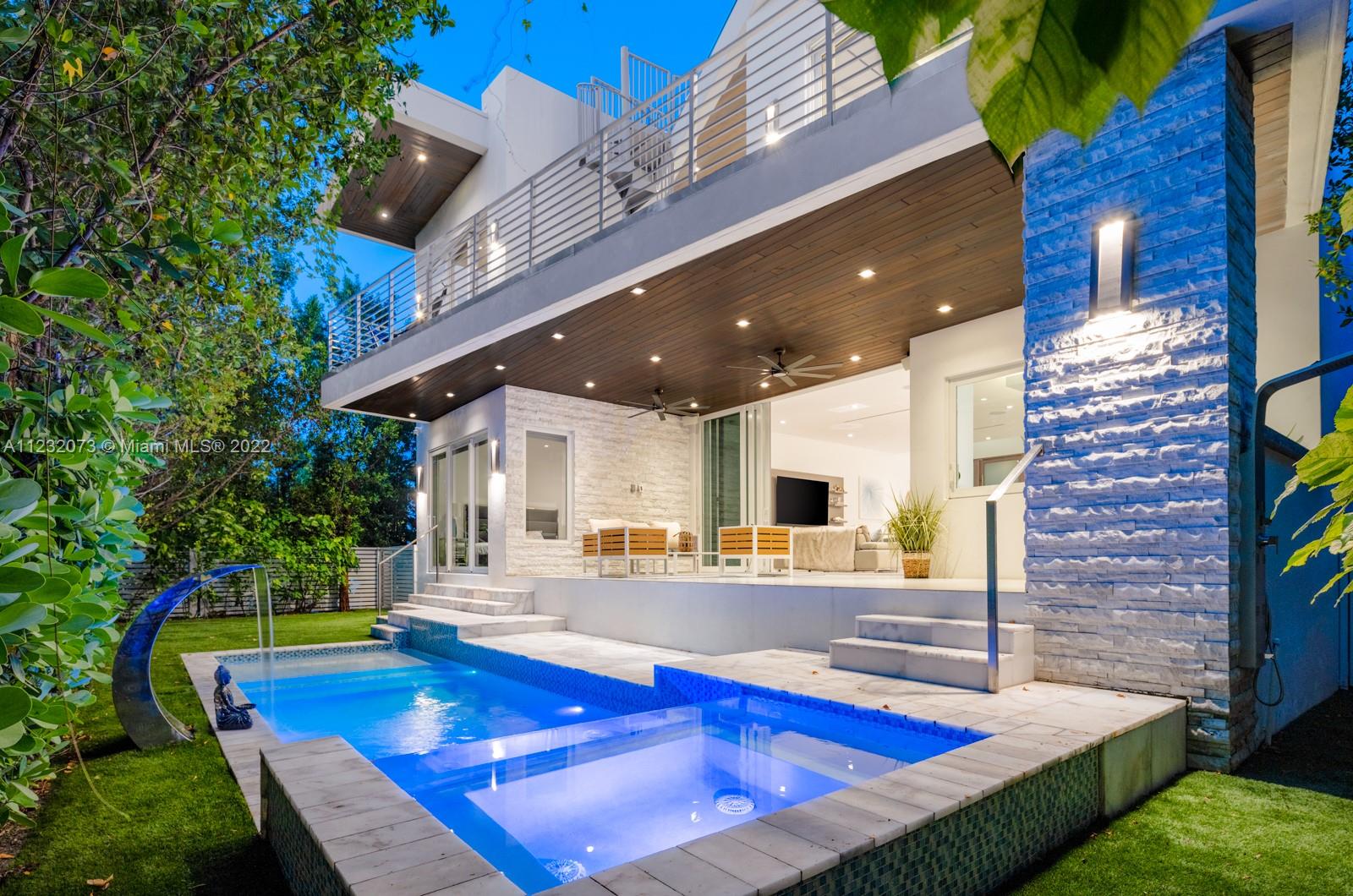 4610 Alton Road Miami Beach, FL 33140 - Photo 2 of 38 a view of kitchen with furniture and garden