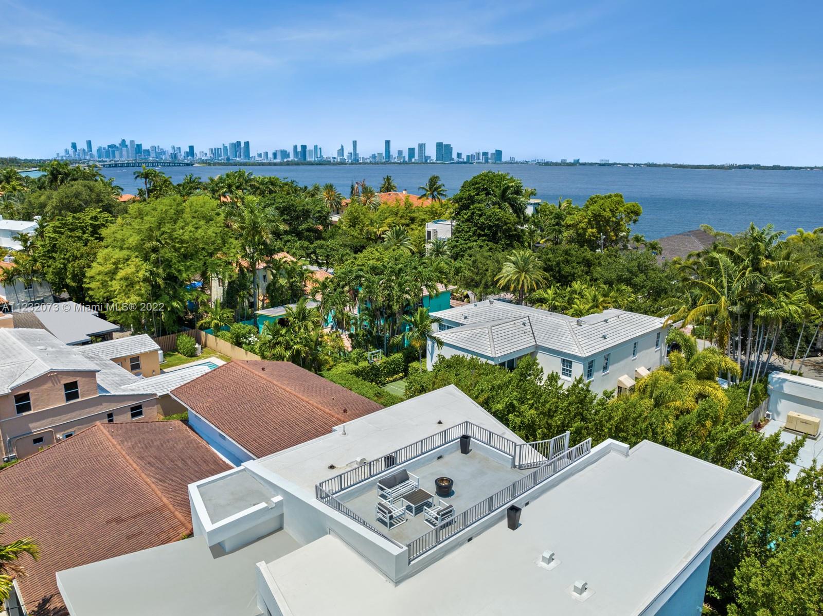 4610 Alton Road Miami Beach, FL 33140 - Photo 36 of 38 an aerial view of a house with a yard basket ball court and outdoor seating