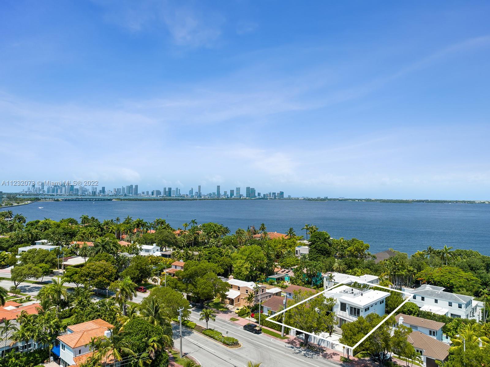 4610 Alton Road Miami Beach, FL 33140 - Photo 38 of 38 an aerial view of a house with a lake view