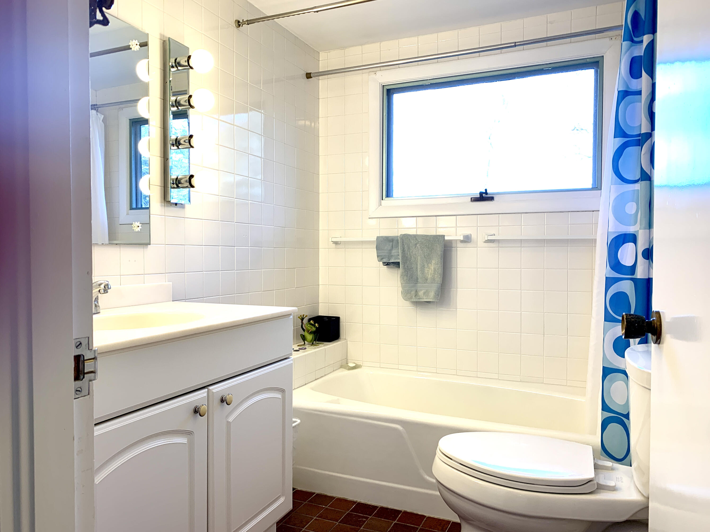 20 Briar Spring Road Orleans, MA 02653 - Photo 31 of 67 a bathroom with a bathtub shower sink vanity and toilet