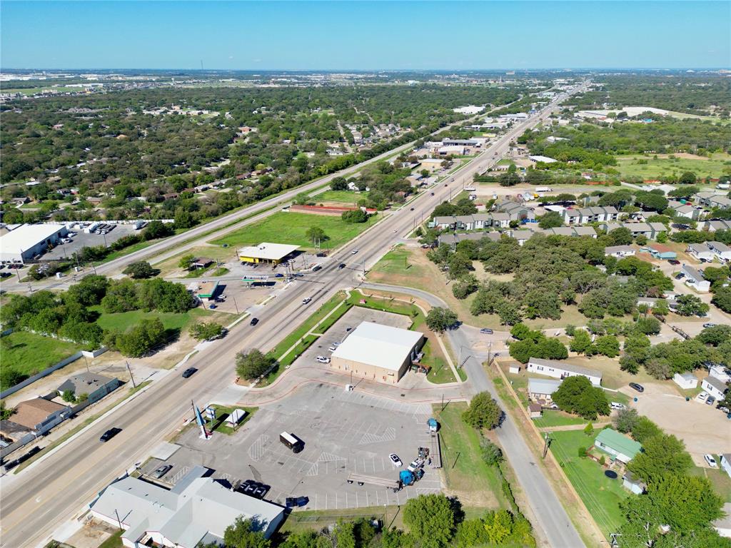 5008 Collett Little Road Fort Worth, TX 76119 - Photo 14 of 17 an aerial view of residential houses with outdoor space