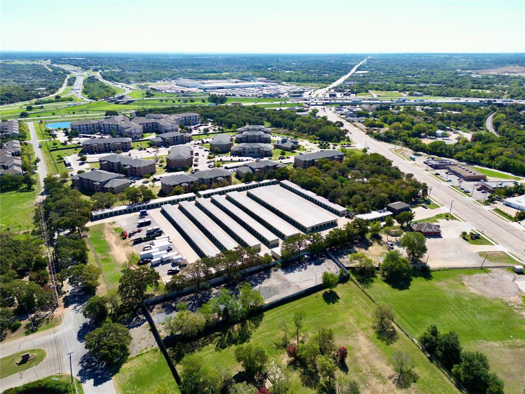 5008 Collett Little Road Fort Worth, TX 76119 - Photo 2 of 17 an aerial view of residential houses with outdoor space