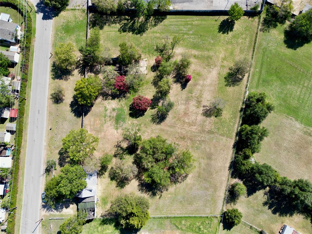 5008 Collett Little Road Fort Worth, TX 76119 - Photo 7 of 17 an aerial view of a residential houses with yard
