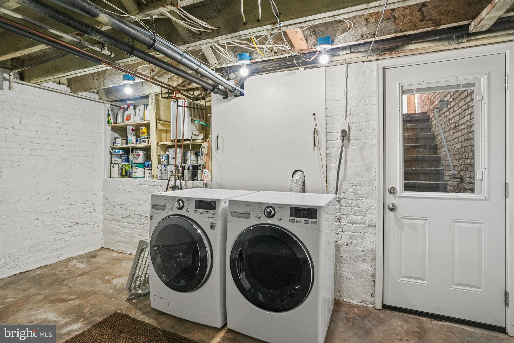 655 F Street Northeast Washington, DC 20002 - Photo 18 of 24 a utility room with dryer and washer
