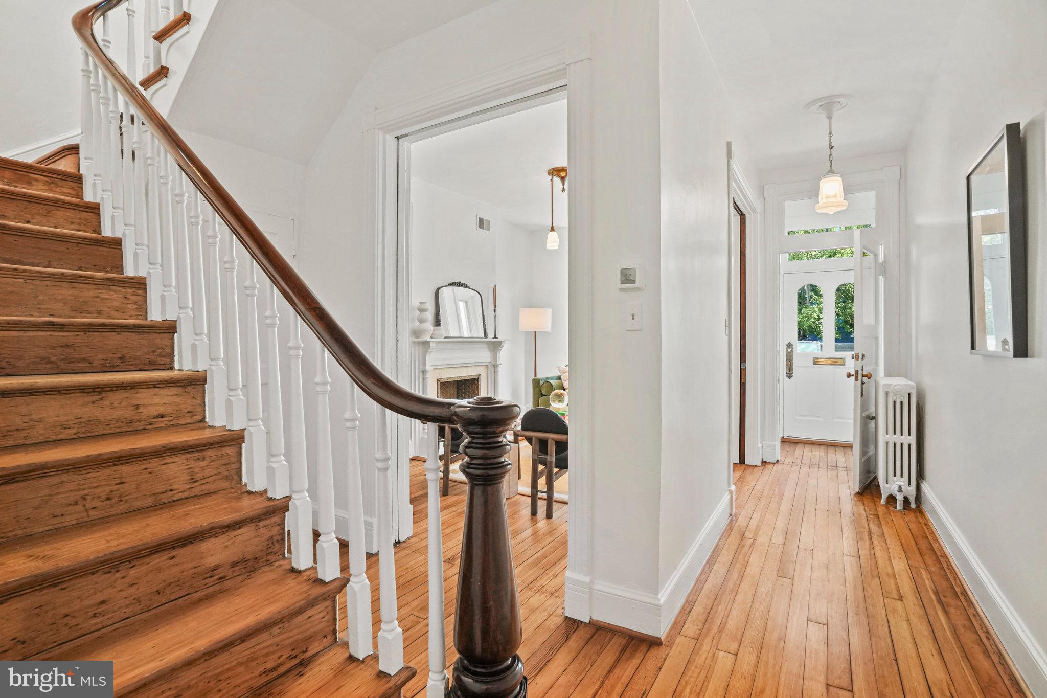 655 F Street Northeast Washington, DC 20002 - Photo 5 of 24 a view of entryway and hall with wooden floor