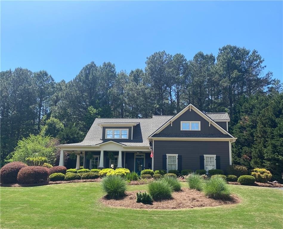 267 Washington Boulevard Dallas, GA 30132 - Photo 1 of 1 a front view of a house with garden