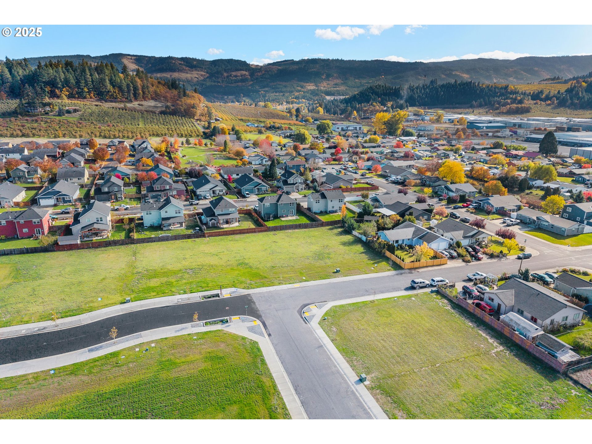 3165 Maple Road Hood River, OR 97031 - Photo 14 of 20 a view of a city with mountains in the background