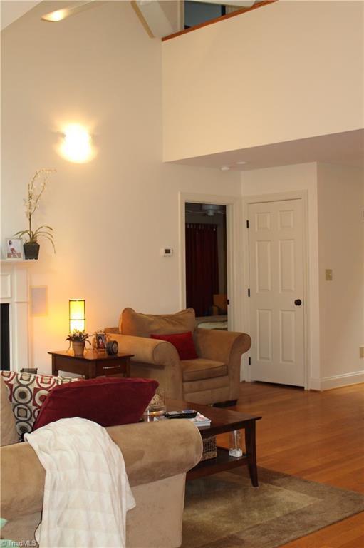 7232 Ledbetter Road Climax, NC 27233 - Photo 11 of 33 The Living Room Features Exposed Balcony To The Upstairs Living Spaces
