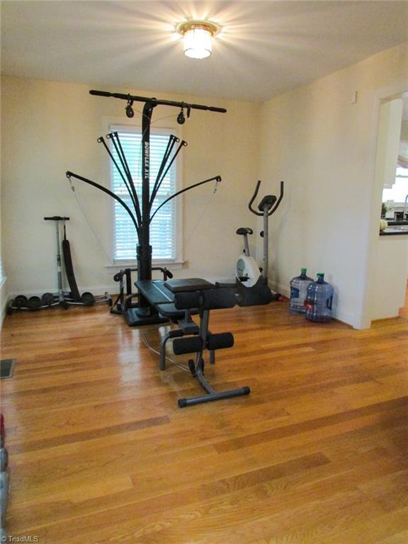 7232 Ledbetter Road Climax, NC 27233 - Photo 13 of 33 Formal Dining Room Currently Being Used As A Workout Space