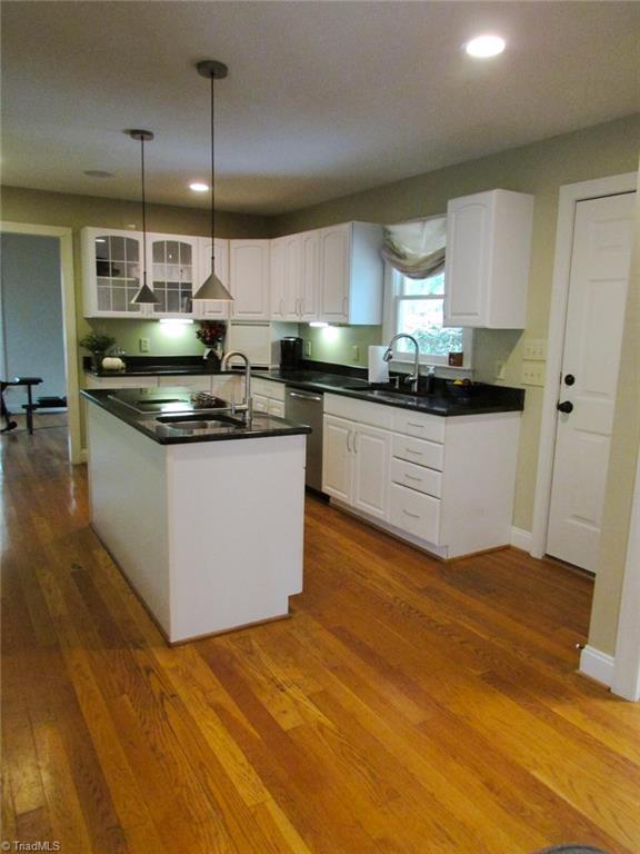 7232 Ledbetter Road Climax, NC 27233 - Photo 16 of 33 Display Cabinetry, A Plethora Of Cabinet Organization Features & Plenty Of Countertops Make This Kitchen Makes Cooking In This Kitchen A Pleasure