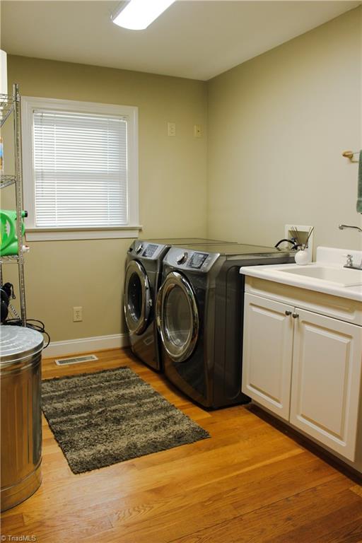 7232 Ledbetter Road Climax, NC 27233 - Photo 18 of 33 Large Laundry Room With Utility Sink & Cabinet