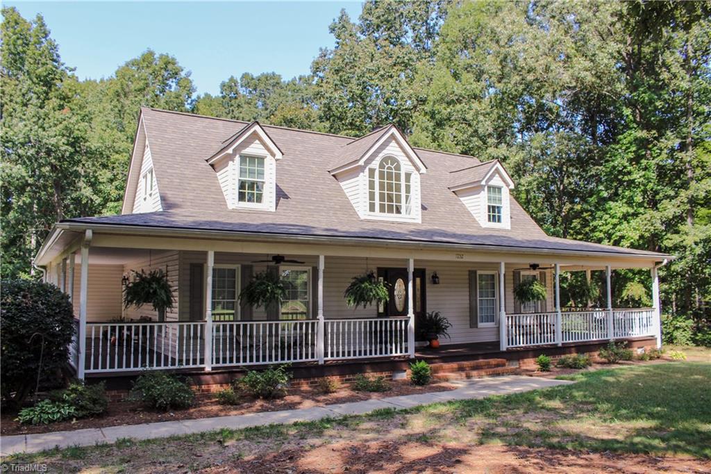 7232 Ledbetter Road Climax, NC 27233 - Photo 3 of 33 New Roof In 2019 & Fantastic Rocking Chair Front Porch That Wraps Around 3 Sides Of This Home