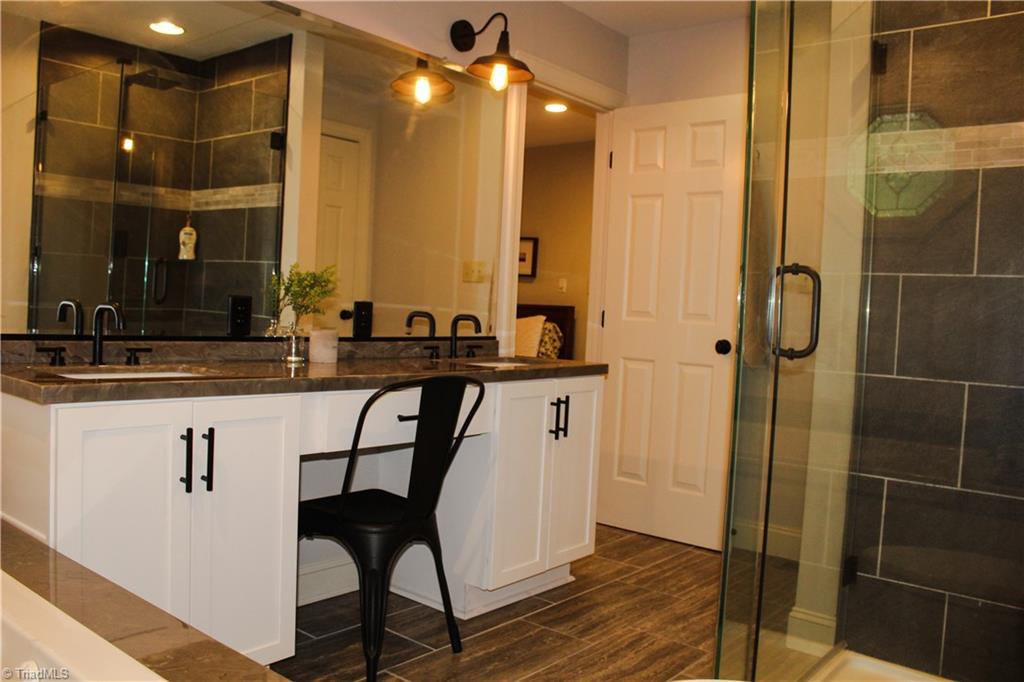7232 Ledbetter Road Climax, NC 27233 - Photo 23 of 33 Vanity Features A Space To Sit & Chill While Getting Ready To Face The World