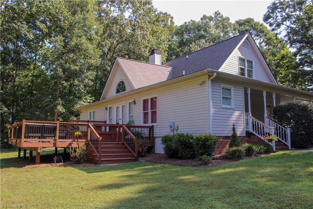 7232 Ledbetter Road Climax, NC 27233 - Photo 27 of 33 Exterior Rear Shows View Of Side Entry Porch & Multi-Level Deck