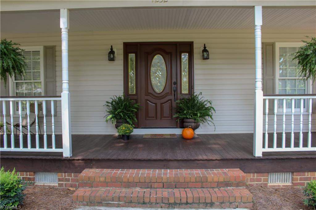 7232 Ledbetter Road Climax, NC 27233 - Photo 5 of 33 The Welcoming Front Porch & Door With Frosted/Etched Glass Allows For Privacy & Natural Light