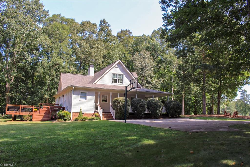 7232 Ledbetter Road Climax, NC 27233 - Photo 7 of 33 Driveway Side View Has Plenty Of Parking Or Room For A Great Game Of Pick-Up Basketball