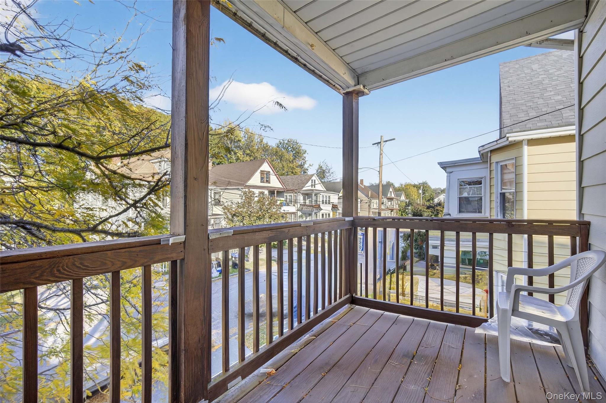 60 Lent Street Poughkeepsie, NY 12601 - Photo 10 of 16 a view of wooden balcony with furniture