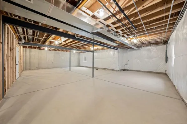 a bathroom with a shower and a sink