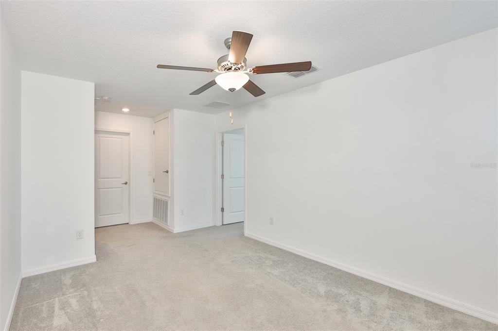 9913 Jackfruit Court Riverview, FL 33578 - Photo 23 of 57 a view of an empty room