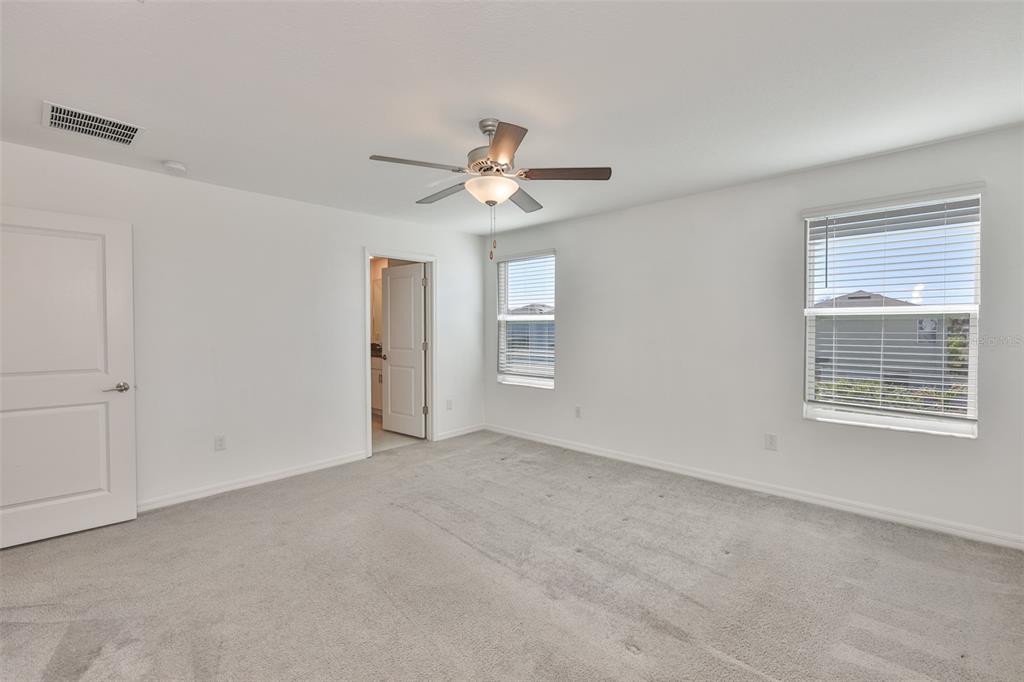 9913 Jackfruit Court Riverview, FL 33578 - Photo 27 of 57 a view of an empty room with a window