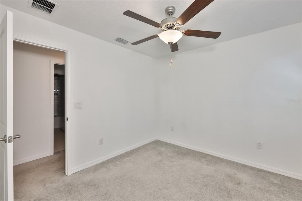 9913 Jackfruit Court Riverview, FL 33578 - Photo 37 of 57 an empty room