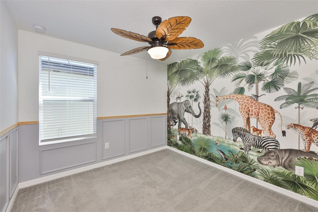 9913 Jackfruit Court Riverview, FL 33578 - Photo 42 of 57 a view of a house with a flower plants