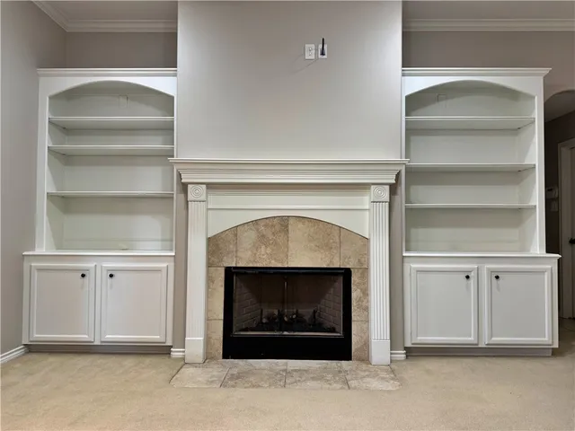 a living room with a fireplace