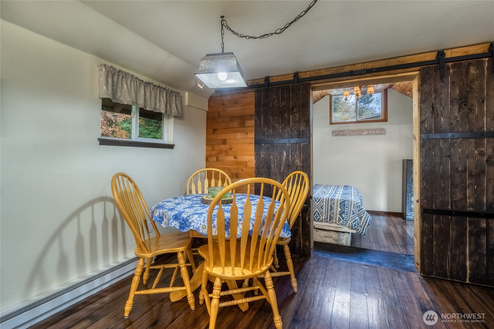 48 Blue Jay Loop Walla Walla, WA 99362 - Photo 11 of 21 a view of a dining room with furniture and wooden floor