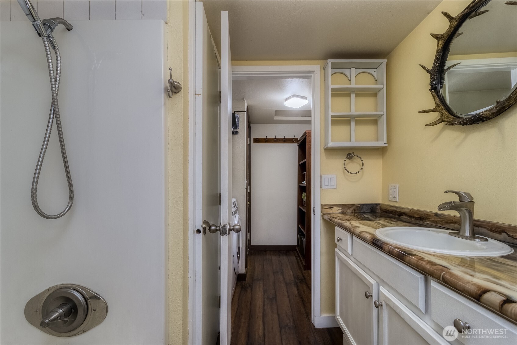 48 Blue Jay Loop Walla Walla, WA 99362 - Photo 15 of 21 a bathroom with a granite countertop sink a mirror and shower