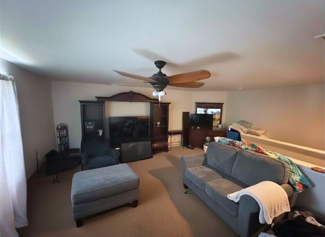 1835 Garnet Breeze Drive Rosharon, TX 77583 - Photo 15 of 19 a living room with furniture and a fireplace