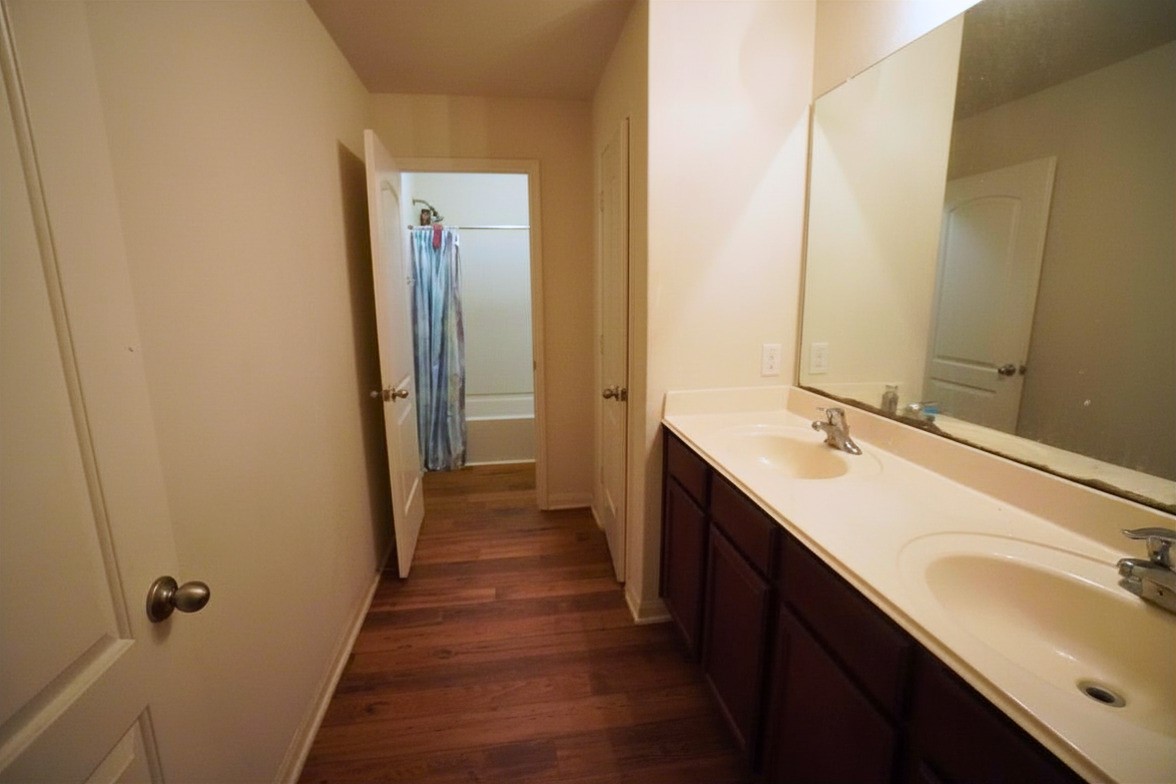 1835 Garnet Breeze Drive Rosharon, TX 77583 - Photo 16 of 19 a bathroom with a double vanity sink and a mirror